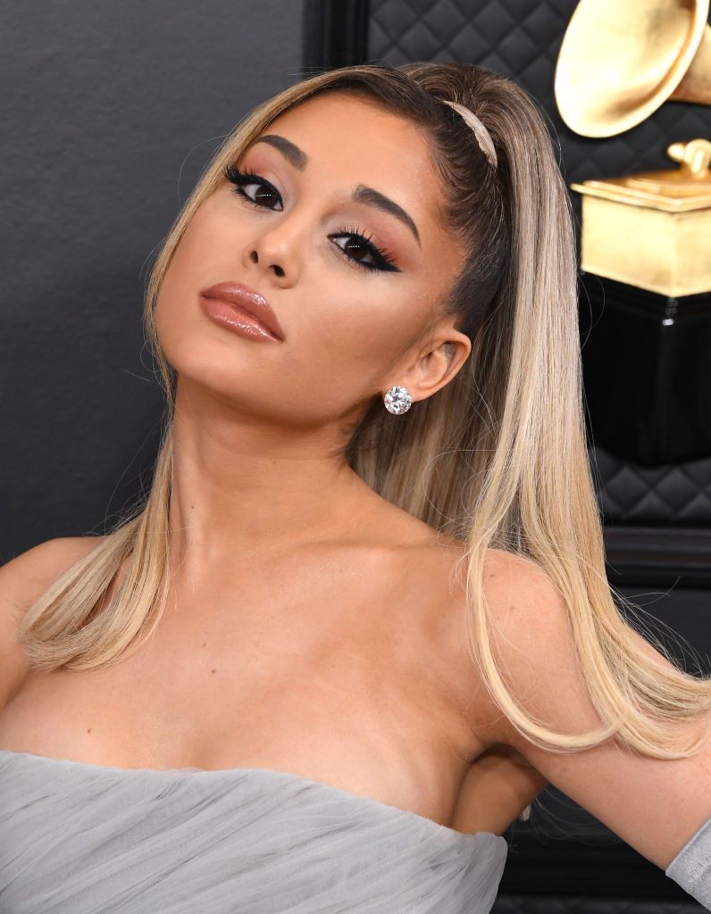 Ariana Grande Puts a Swooped Twist on Her Trademark Half-Up, Half-Down  Hairstyle