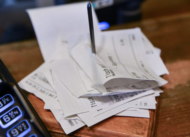 24 february 2020, berlin next to a cash register in a cafe, sales receipts are skewered photo jens kalaenedpa zentralbildzb photo by jens kalaenepicture alliance via getty images