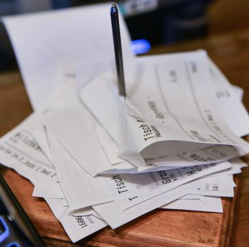 24 february 2020, berlin next to a cash register in a cafe, sales receipts are skewered photo jens kalaenedpa zentralbildzb photo by jens kalaenepicture alliance via getty images