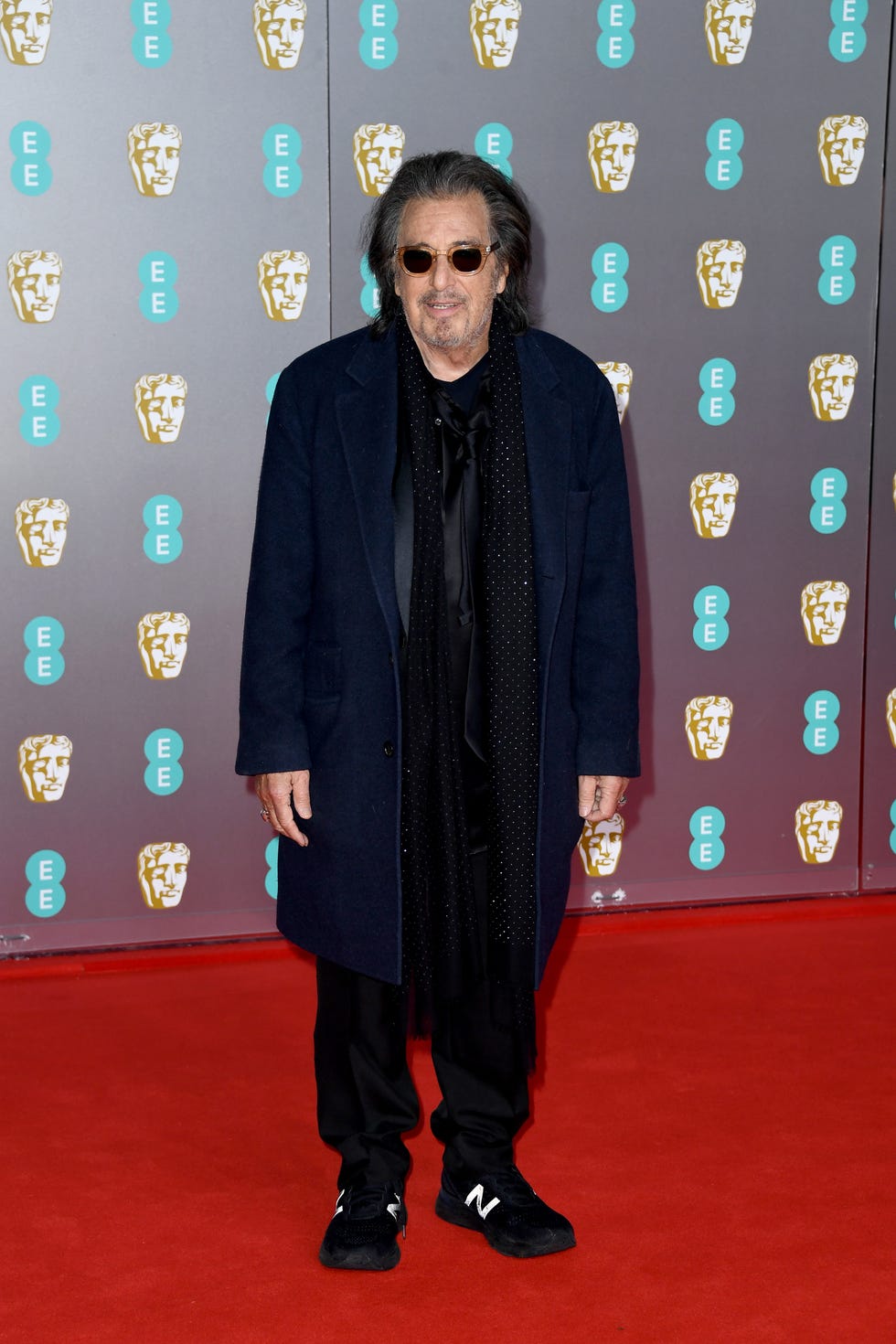 Al Pacino falls on red carpet at BAFTAs