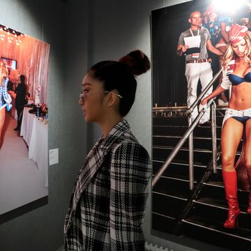 st petersburg, russia   february 27, 2020 a woman attends an exhibition of works by australian photographer russell james titled a decade backstage at victorias secret fashion show at the erarta museum of contemporary art alexander demianchuktass photo by alexander demianchuk\tass via getty images