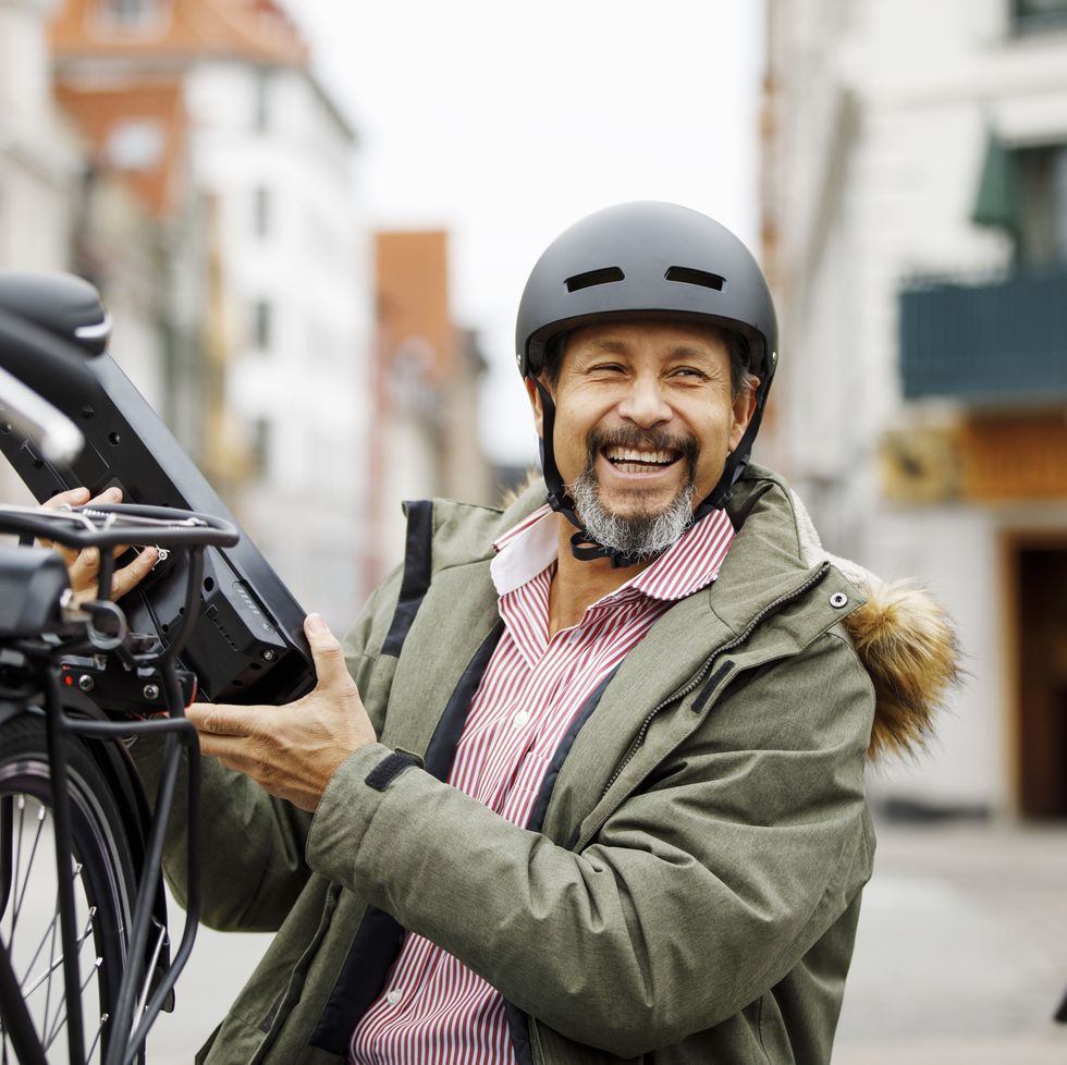 smiling man is so happy with bicycle