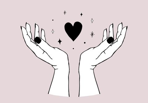 two hands holding a heart