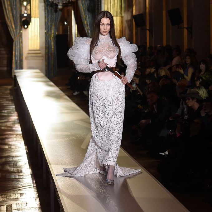Bella Hadid Frees The Nipple In A Wedding Gown During PFW