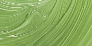Aloe vera gel texture. Green natural skincare background