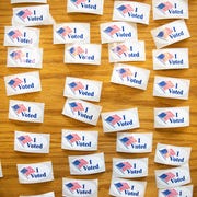 TOPSHOT-US-POLITICS-VOTE topshot i voted stickers cover a table at a polling station during the north carolina primary on super tuesday in charlotte, north carolina on march 3, 2020 forteen states and american samoa are holding presidential primary elections, with over 1400 delegates at stake americans vote tuesday in primaries that play a major role in who will challenge donald trump for the presidency, a day after key endorsements dramatically boosted joe bidens hopes against surging leftist bernie sanders the backing of biden by three of his ex rivals marked an unprecedented turn in a fractured, often bitter campaign photo by logan cyrus afp photo by logan cyrusafp via getty images