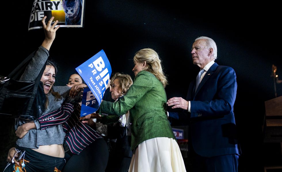los angeles, california   march 3, 2020 democratic presidential candidate former vice president joe biden, accompanied by his wife dr jill biden, cope with protestors that got up on the stage during a super tuesday election night party at baldwin hills recreation center in los angeles, california on tuesday march 3, 2020 photo by melina marathe washington post via getty images