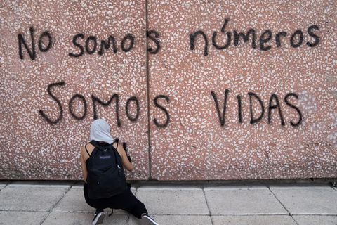 mexico city, mexico march 08 a demonstrator paints a graffiti that reads we are not numbers, we are lives during a rally on international womens day on march 8, 2020 in mexico city, mexico photo by toya sarno jordangetty images