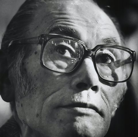 fred korematsu looks to the left and wears large eyeglasses