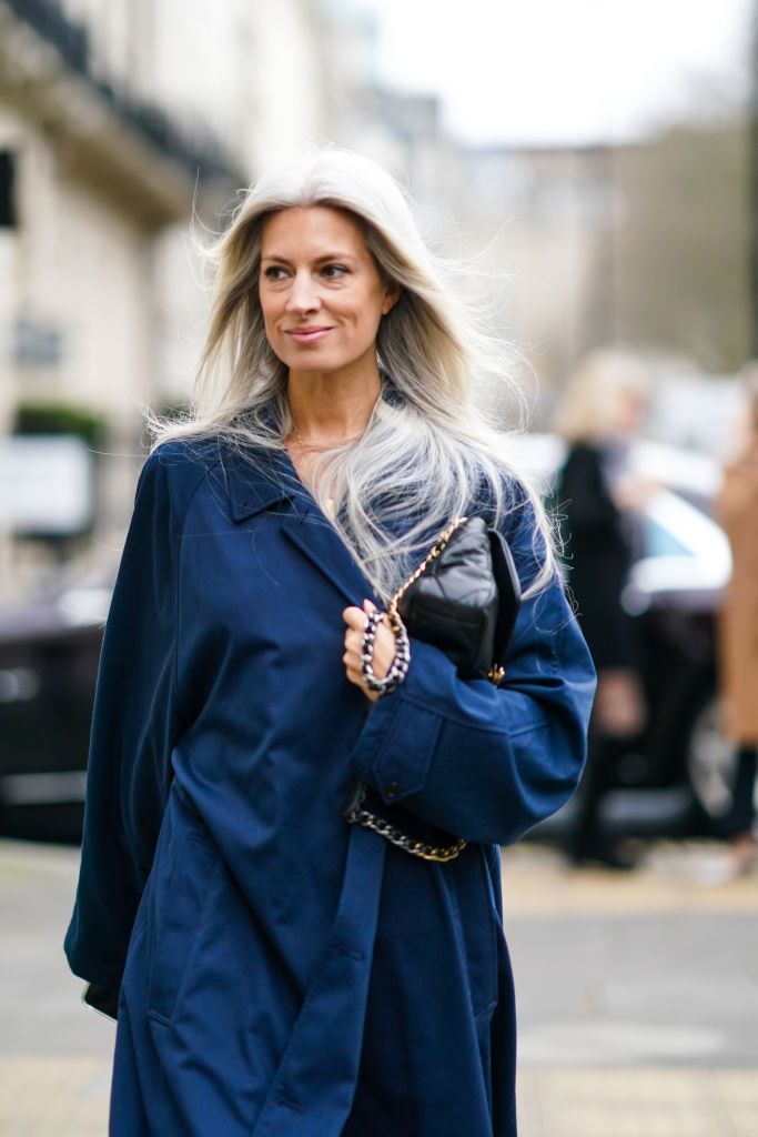 london, england   february 15 sarah harris wears a blue long coat, a black quilted bag, during london fashion week fall winter 2020, on february 15, 2020 in london, england photo by edward berthelotgetty images