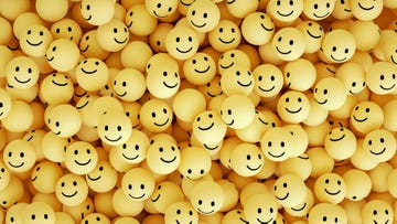 3d rendering of emoji with smiley face large group of objects yellow background