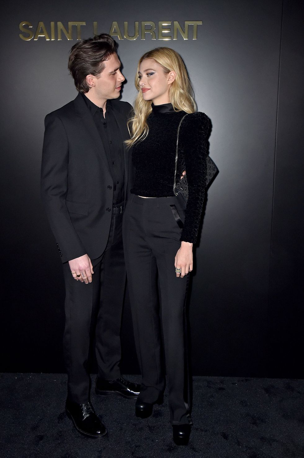 paris, france   february 25 editorial use only brooklyn beckham and nicola peltz attends the saint laurent show as part of the paris fashion week womenswear fallwinter 20202021 on february 25, 2020 in paris, france photo by dominique charriauwireimage