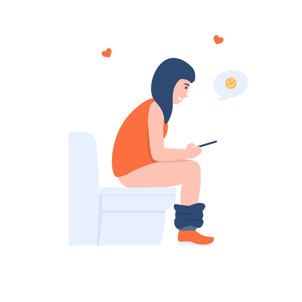 cheerful girl is sitting on the toilet and is texting on the phone flat vector cartoon illustration isolated white background