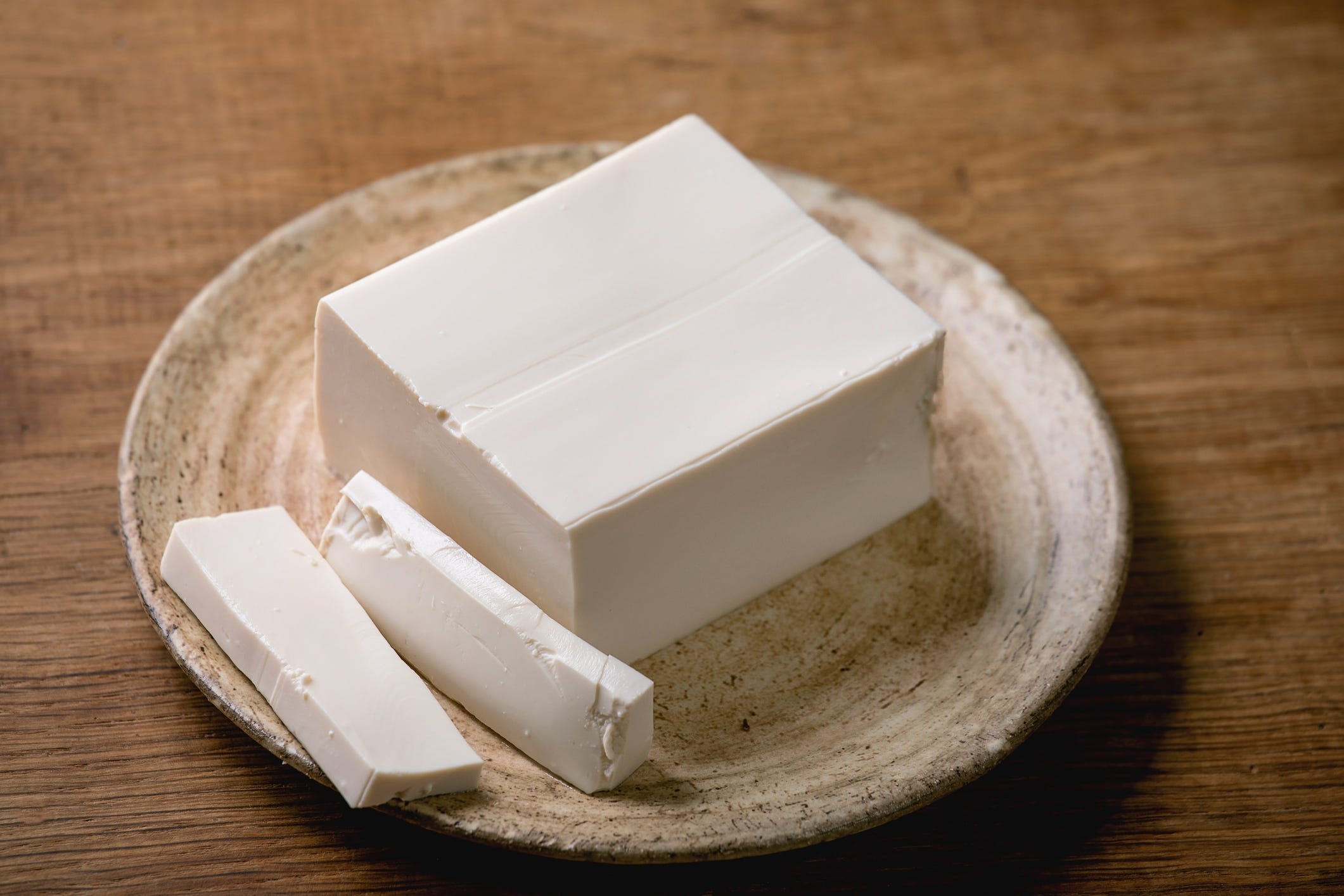 silken tofu on a ceramic plate