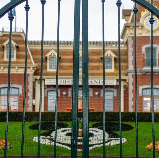 anaheim, ca   march 16 a lock hangs on the center gate between the turnstiles at the entrance to disneyland in anaheim, ca, on monday, mar 16, 2020 the entire disneyland resort is shutting down due to the coronavirus covid 19 outbreak photo by jeff gritchenmedianews grouporange county register via getty images