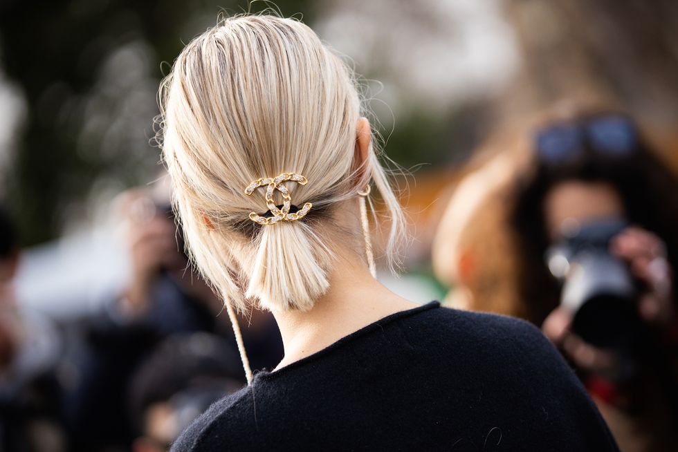 Hairstyle, Earrings, Style, Camera, Blond, Photographer, Long hair, Street fashion, Hair accessory, Digital camera, 