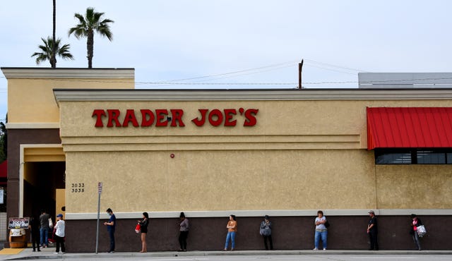 pasadena, ca   march 31  customers practice social distancing due to the coronavirus pandemic as they wait in line outside trader joes in pasadena on tuesday, march 31, 2020 photo by keith birminghammedianews grouppasadena star news via getty images