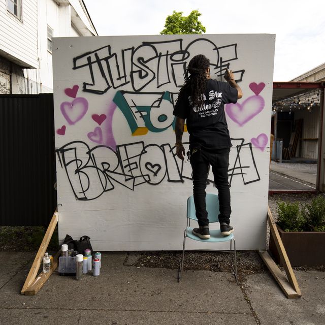 louisville, ky   may 29  grafitti artist “resko” paints a mural near the march’s start on may 29, 2020 in louisville, kentucky protests have erupted after recent police related incidents resulting in the deaths of african americans breonna taylor in louisville and george floyd in minneapolis, minnesota photo by brett carlsengetty images