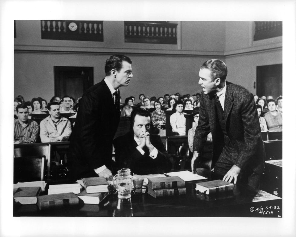 unknown actor and james stewart facing each other in court in a scene from the film 'anatomy of a murder', 1959  photo by columbia picturesgetty images