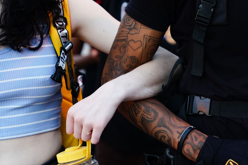 atlanta, ga   may 31 protesters lock arms during a demonstration on may 31, 2020 in atlanta, georgia across the country, protests have erupted following the recent death of george floyd while in police custody in minneapolis, minnesota photo by elijah nouvelagegetty images