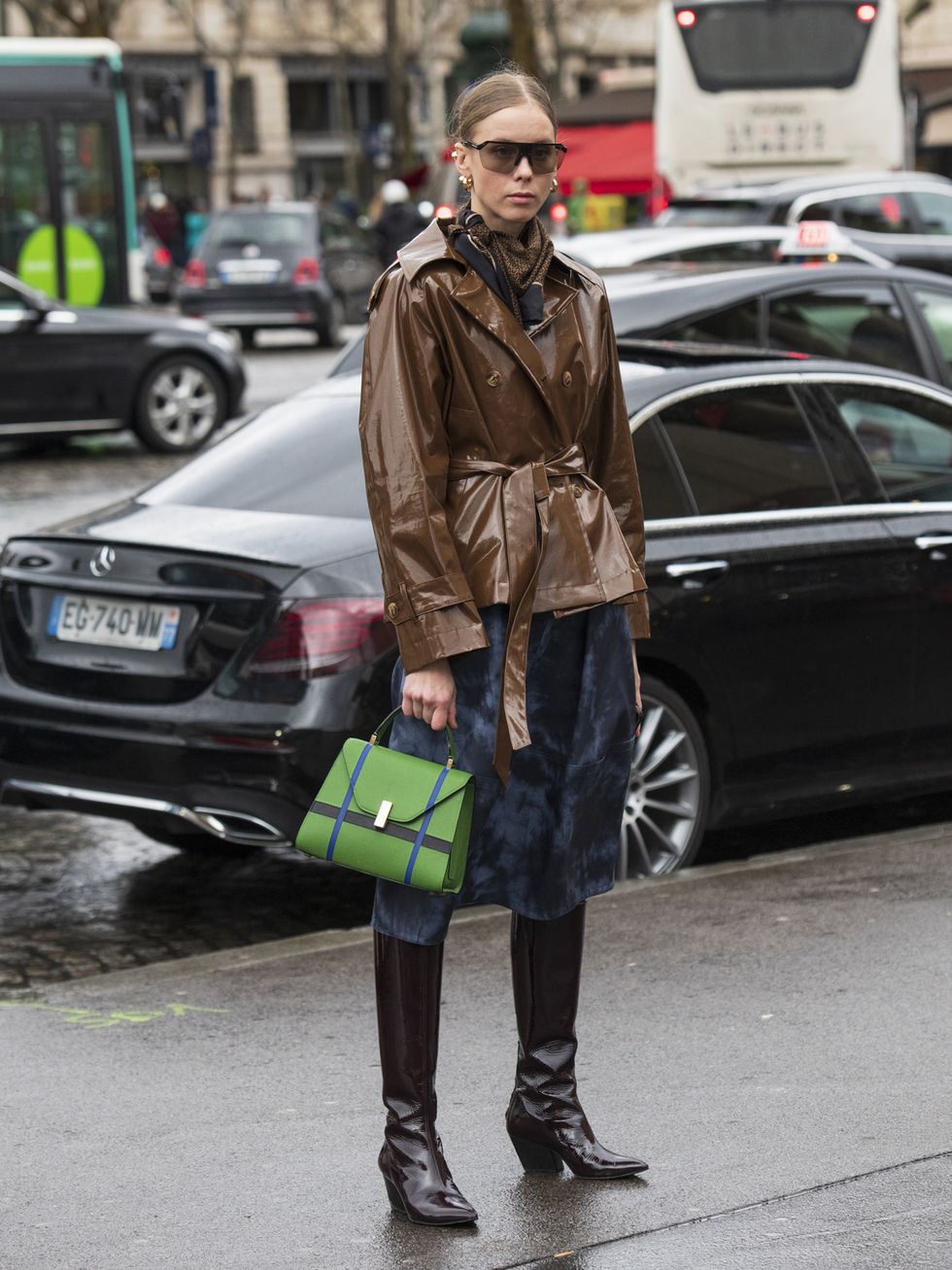 paris, france   february 27 fashion editor hilda sandstrom wears tom ford sunglasses, nanuschka coat, tibi skirt, aeyde boots and valextra bag on february 27, 2020 in paris, france photo by kirstin sinclairgetty images