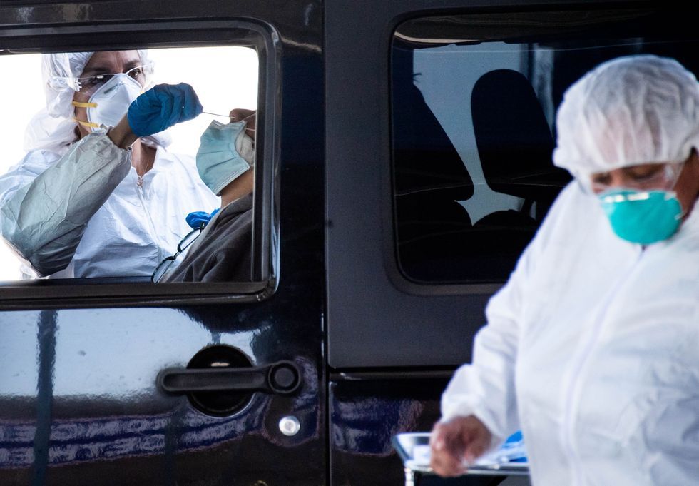 baldwin park, ca   april 14 nurses collect swab samples for covid 19 testing at baldwin park"u2019s new drive thru testing site on tuesday, april 14, 2020 during the coronavirus outbreak photo by sarah reingewirtzmedianews grouplos angeles daily news via getty images"n