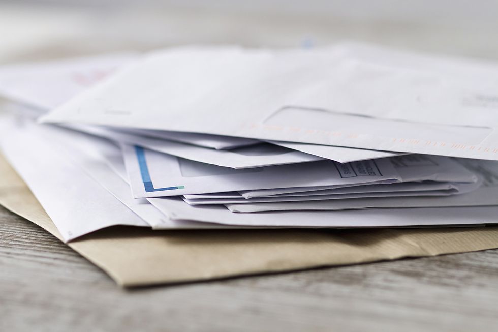 a stack of professional or invoice letters