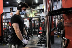 a man clad in mask due to the covid 19 coronavirus pandemic exercises at a gym in arbil, the capital of the northern iraqi kurdish autonomous region, on june 13, 2020 photo by safin hamed  afp photo by safin hamedafp via getty images