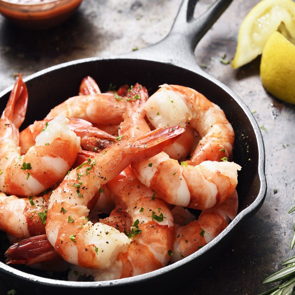 shrimps with cocktail sauce and seasoning