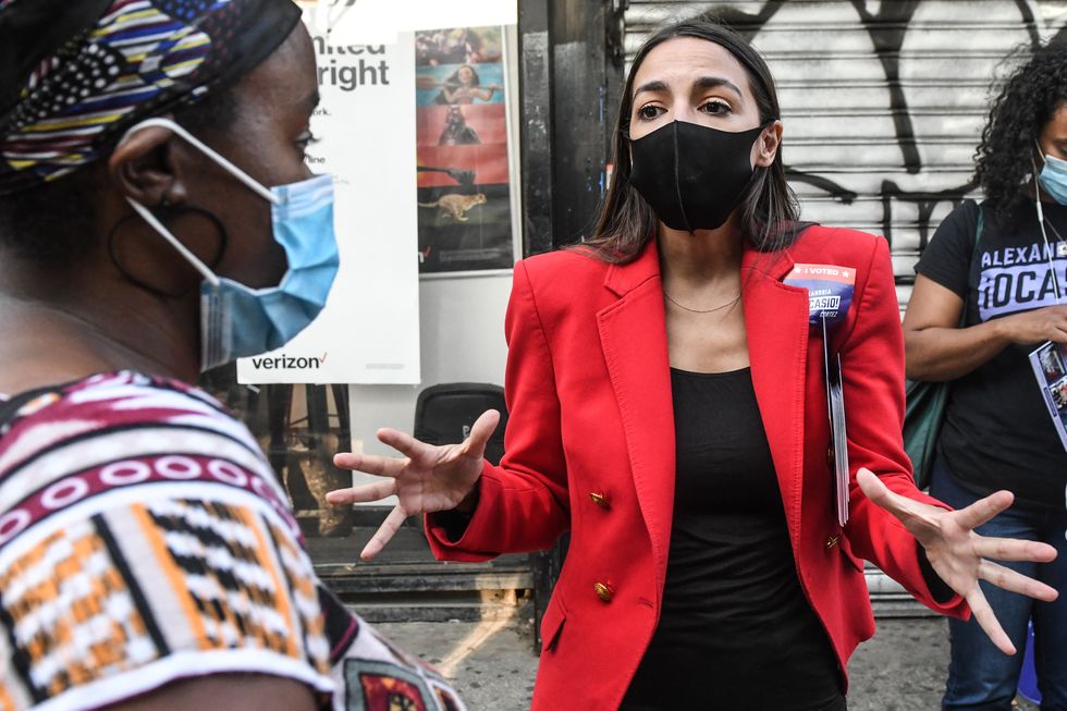 new york, ny   june 23 rep alexandria ocasio cortez d ny campaigns on june 23, 2020 in the bronx borough of new york city ocasio cortez is running for re election in the 14th congressional district against michelle caruso cabrera, a former cnbc anchor photo by stephanie keithgetty images