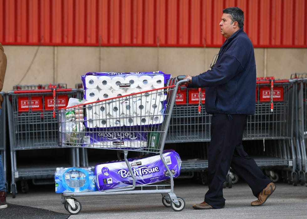 people leave a costco outlet with a trolley full of toilet paper and cleaning products as fears of a second wave of covid 19 have sparked a rush on some supermarket items in melbourne on june 24, 2020   major supermarkets in the state of victoria have reimposed buying limits on toilet paper and other essentials after a renewed escalation in demand sparked fears of a return to scenes of panic buying seen early in the pandemic photo by william west  afp photo by william westafp via getty images