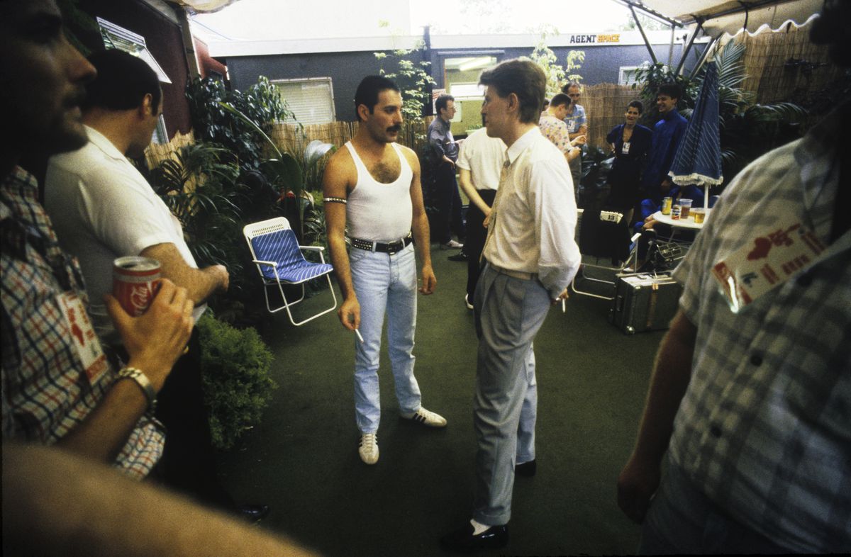Freddie Mercury and David Bowie talking backstage at the Live Aid concert,