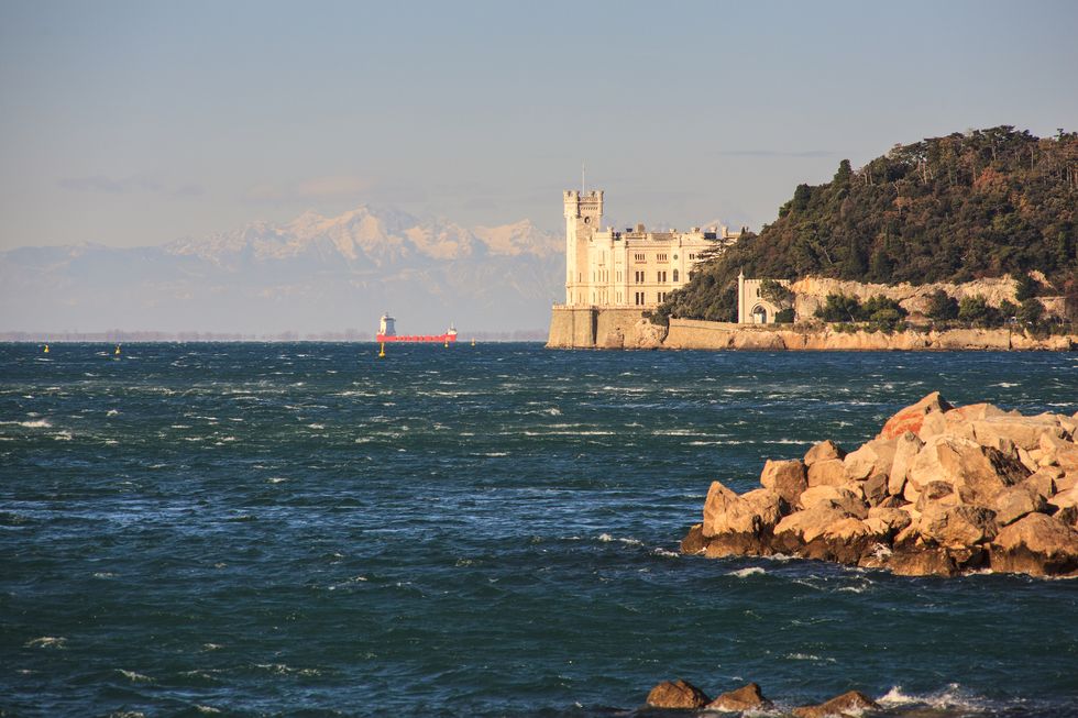 view of miramare castle at sunset, trieste