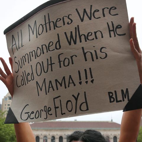 boston, ma   june 27 shellee mendes, a mother of three, raised her sign during the march like a mother for black lives rally at copley square in boston, ma on june 27, 2020 organizers say the peaceful, family friendly event was created in response to the murders of george floyd, breonna taylor, and ahmaud arbery to empower mothers to stand in solidarity against racism and anti blackness while demanding radical systemic change photo by craig f walkerthe boston globe via getty images