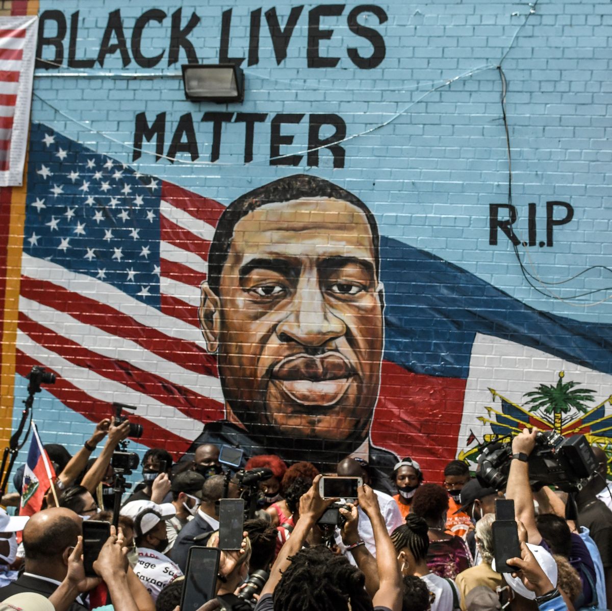 new york, ny   july 13 a mural painted by artist kenny altidor depicting george floyd is unveiled on a sidewall of ctown supermarket on july 13, 2020 in the brooklyn borough new york city george floyd was killed by a white police officer in minneapolis and his death has sparked a national reckoning about race and policing in the united states  photo by stephanie keithgetty images