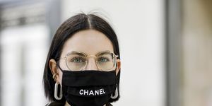 duesseldorf, germany   may 17 influencer maria barteczko, wearing a black logo face mask by 2nd couture,   and gold round retro glasses by ray ban during a street style shooting on may 17, 2020 in duesseldorf, germany photo by streetstyleographgetty images