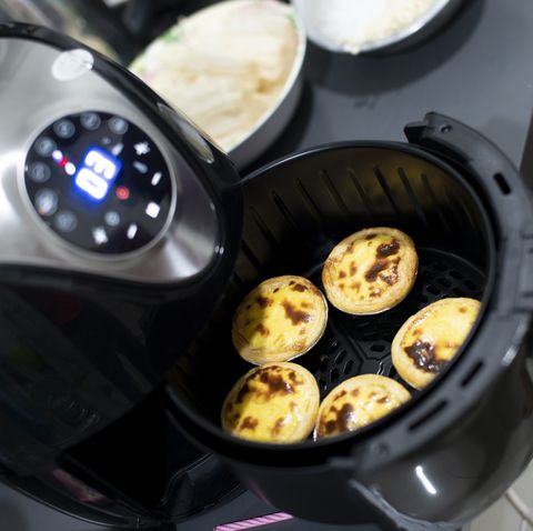 air fryer machine  in home, egg tart  selective focus