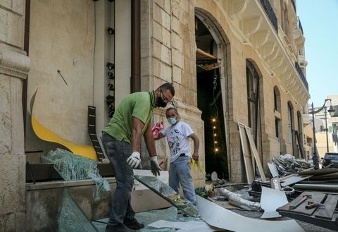05 august 2020, lebanon, beirut workers removed shattered glass of a shop in the plush beirut downtown a day after a massive explosion in beiruts port that rocked the whole city, killing at least 100 people and injured thousands photo marwan naamanidpa photo by marwan naamanipicture alliance via getty images