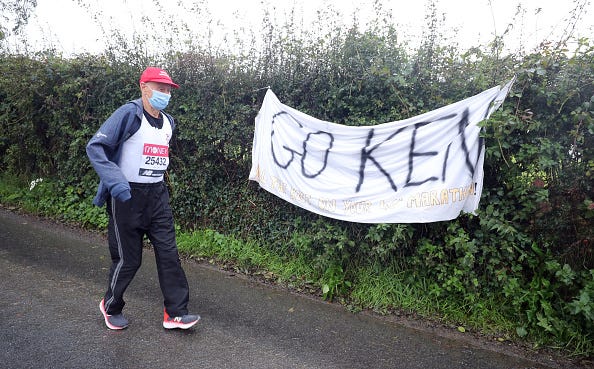 ken jones, 87, takes part in the historic first virtual london marathon during gale force winds and rain in his home town of strabane, west tyrone this years event was postponed from april 26 due to the covid 19 pandemic and 45,000 runners will now tackle the distance on a course of their own choosing with their progress tracked by the official app photo by niall carsonpa images via getty images