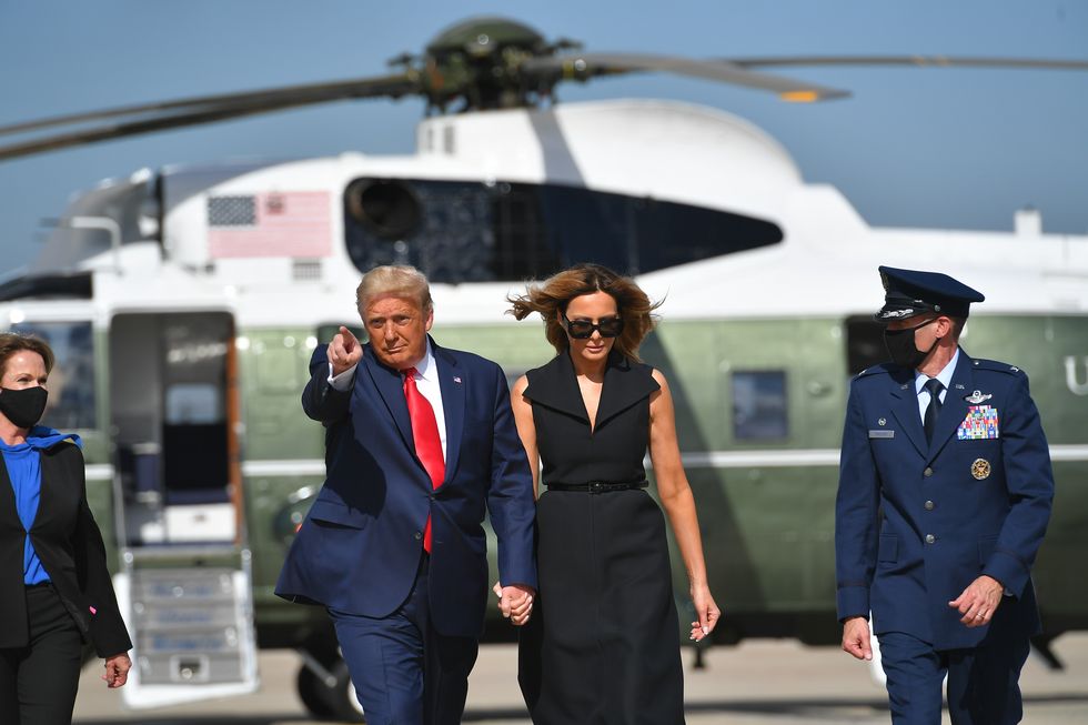 us president donald trump and first lady melania trump arrive to board air force one at joint base andrews in maryland on october 22, 2020   president trump travels to nashville, tennessee, for the final presidential debate photo by mandel ngan  afp photo by mandel nganafp via getty images