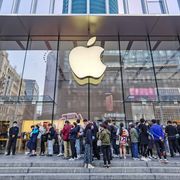 apple black friday deals 2021, people wait outside an apple store