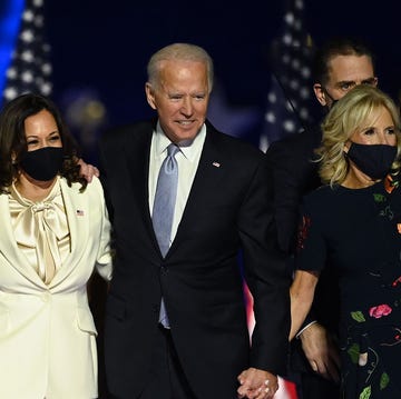 TOPSHOT-US-VOTE-BIDEN-HARRIS-POLITICS topshot us president elect joe biden and vice president elect kamala harris stand with spouses jill biden and doug emhoff after delivering remarks in wilmington, delaware, on november 7, 2020, after being declared the winners of the presidential election photo by jim watson afp photo by jim watsonafp via getty images