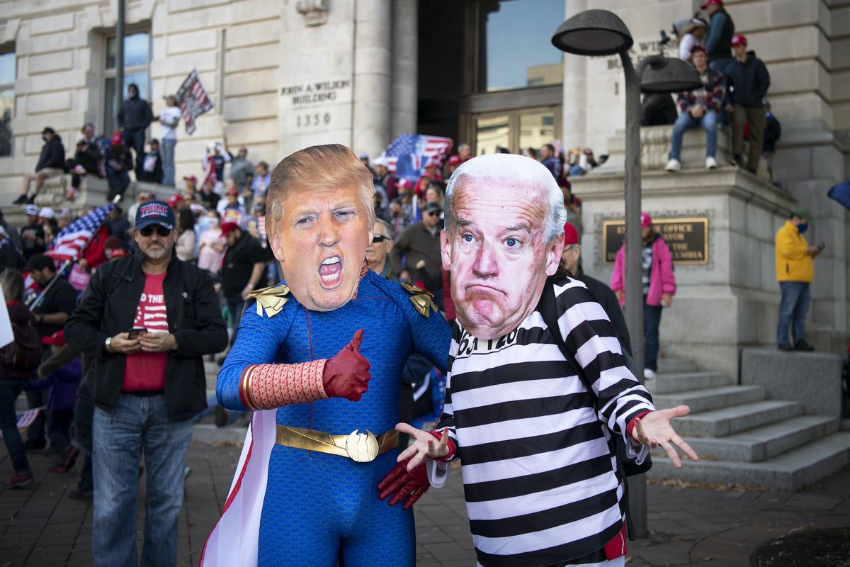 united states   november 14 trump supporters dressed up as president donald trump and president elect joe biden walk around freedom plaza during the million maga march in washington on saturday, nov 14, 2020 photo by caroline brehmancq roll call