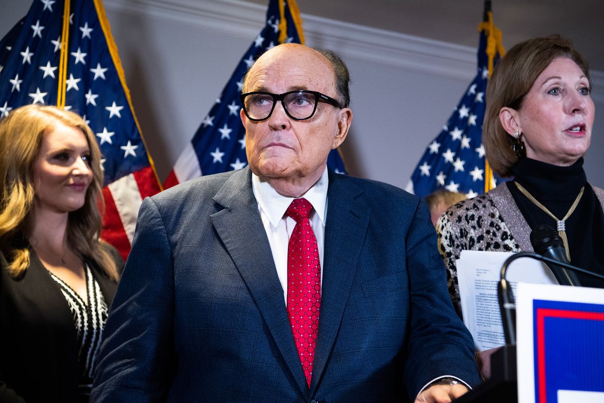 united states   november 19 rudolph giuliani, attorney for president donald trump, conducts a news conference at the republican national committee on lawsuits regarding the outcome of the 2020 presidential election on thursday, november 19, 2020 trump attorneys jenna ellis, left,and sydney powell, also appear photo by tom williamscq roll call, inc via getty images