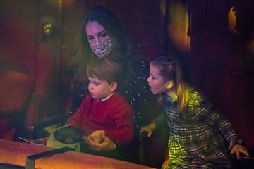 london, england   december 11 catherine, duchess of cambridge, prince louis and princess charlotte attend a special pantomime performance at londons palladium theatre, hosted by the national lottery, to thank key workers and their families for their efforts throughout the pandemic on december 11, 2020 in london, england photo by  aaron chown   wpa poolgetty images