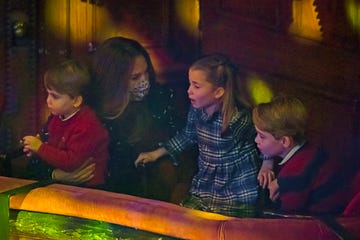 london, england   december 11 catherine, duchess of cambridge, prince louis, princess charlotte and prince george attend a special pantomime performance at london's palladium theatre, hosted by the national lottery, to thank key workers and their families for their efforts throughout the pandemic on december 11, 2020 in london, england photo by  aaron chown   wpa poolgetty images