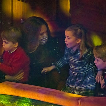 The Duke and Duchess Of Cambridge And Their Family Attend Special Pantomime Performance To Thank Key Workers london, england december 11 catherine, duchess of cambridge, prince louis, princess charlotte and prince george attend a special pantomime performance at london's palladium theatre, hosted by the national lottery, to thank key workers and their families for their efforts throughout the pandemic on december 11, 2020 in london, england photo by aaron chown wpa poolgetty images