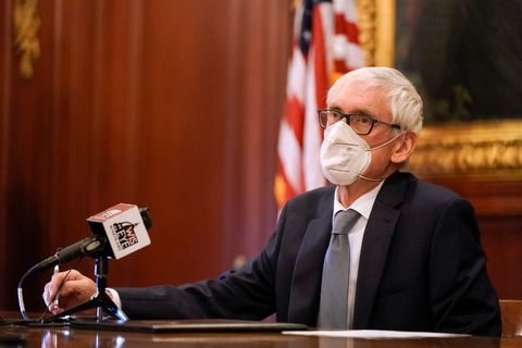 madison, wisconsin   december 14 wisconsin gov tony evers, a member of wisconsins electoral college, casts his vote for the presidential election at the state capitol on december 14, 2020 in madison, wisconsin photo by morry gash poolgetty images