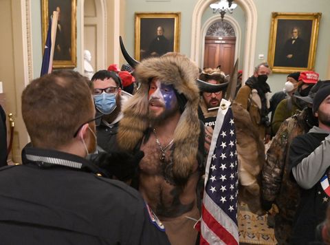 topshot   supporters of us president donald trump, including member of the qanon conspiracy group jake a, aka yellowstone wolf c, enter the us capitol on january 6, 2021, in washington, dc   demonstrators breeched security and entered the capitol as congress debated the a 2020 presidential election electoral vote certification photo by saul loeb  afp photo by saul loebafp via getty images