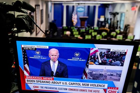 washington, dc   january 06 president elect joe biden is shown speaking on a monitor in the white house briefing room about the violence during the ratification of the 2020 election on january 6, 2021 in washington, dc a pro trump mob entered the us capitol building after mass demonstrations in the nations capital photo by joshua robertsgetty images
